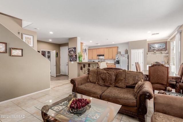 living room featuring light tile patterned floors