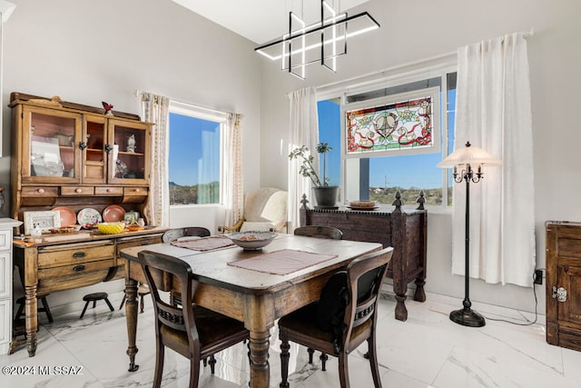 dining room featuring an inviting chandelier