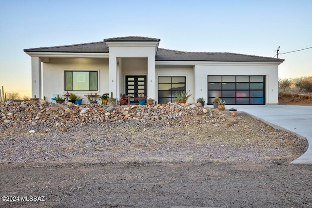 prairie-style house with a garage