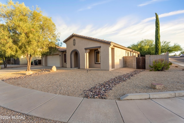 view of front of house with a garage