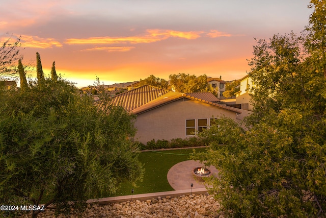 view of property exterior at dusk