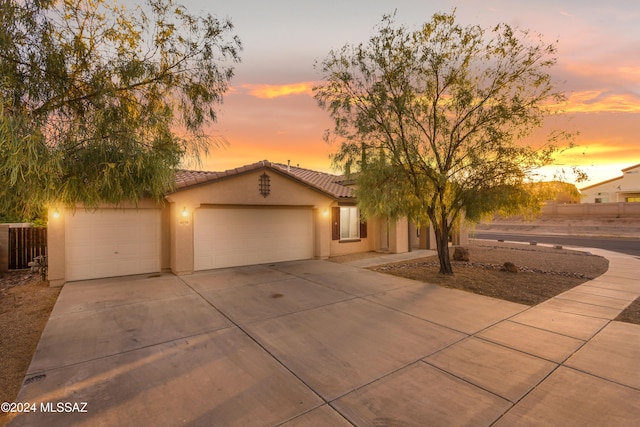 view of front of property featuring a garage