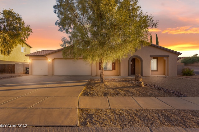 view of front of property featuring a garage