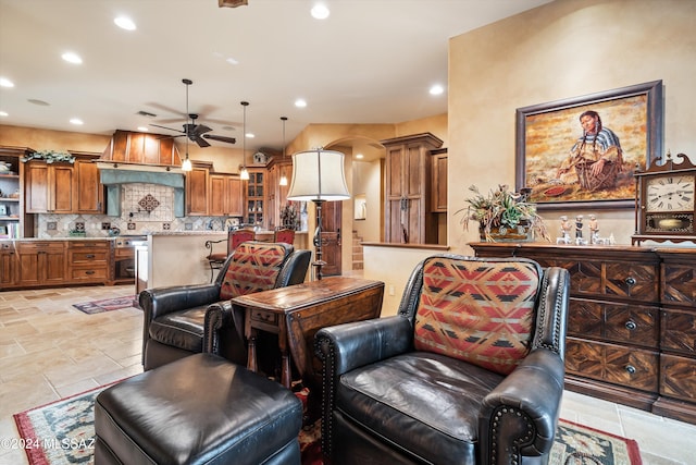 living room with ceiling fan