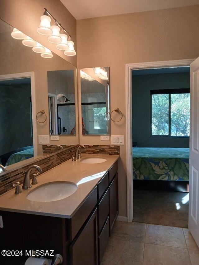 bathroom with vanity and tile patterned flooring