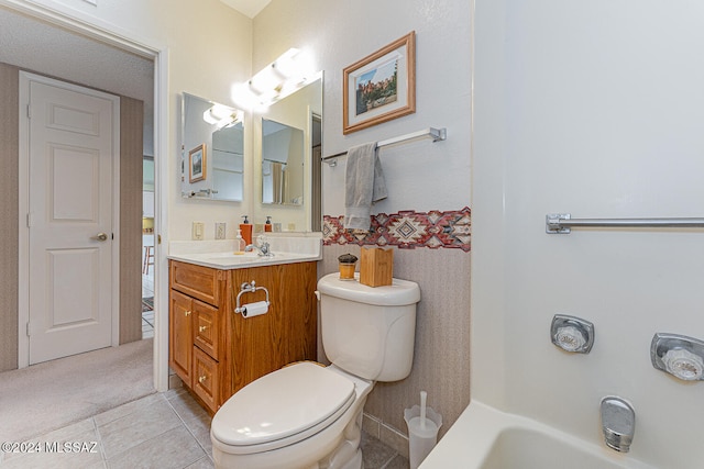 full bathroom featuring vanity, tile patterned floors, toilet, shower with separate bathtub, and a textured ceiling