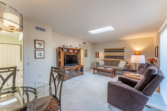 living room with light carpet