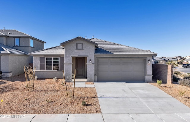 view of front of home with a garage