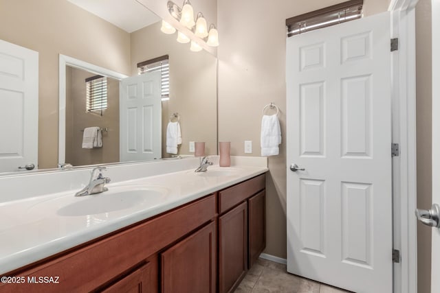 bathroom with vanity and tile patterned floors