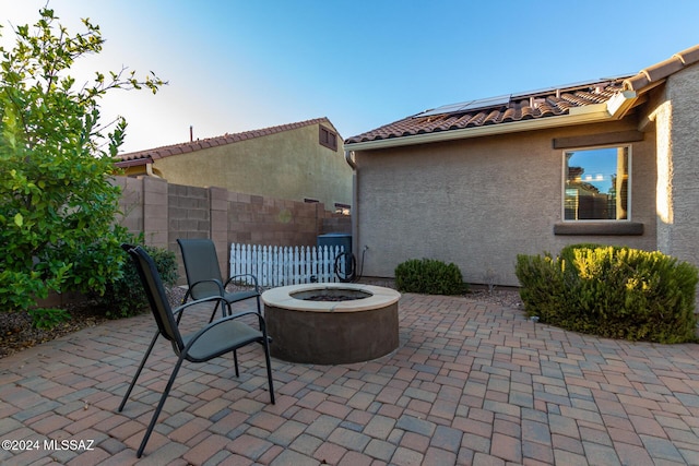 view of patio featuring a fire pit