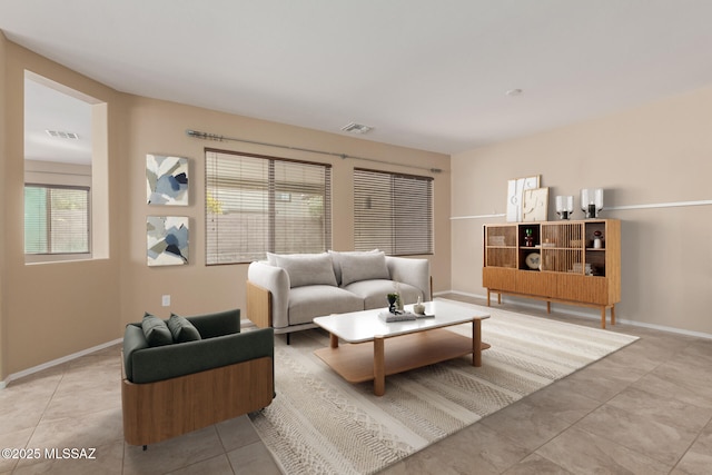 8869 W Irongate Rd, Marana, AZ 85653 - tiled living area with baseboards