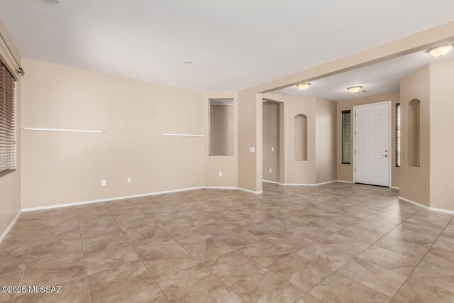 8869 W Irongate Rd, Marana, AZ 85653 - unfurnished room with baseboards