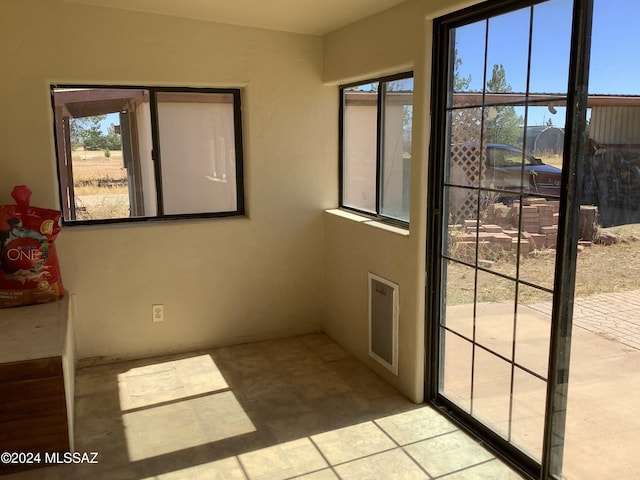 7857 W Winchester Easement, Willcox, AZ 85643 - doorway to outside with tile patterned floors