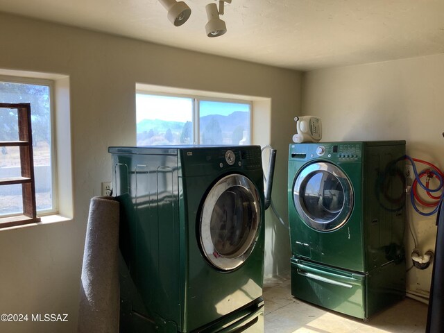 laundry area featuring separate washer and dryer