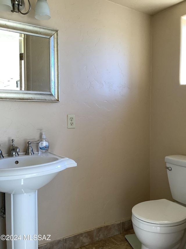 7857 W Winchester Easement, Willcox, AZ 85643 - half bathroom with baseboards and toilet