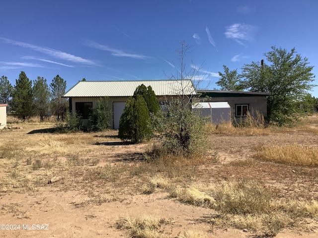7857 W Winchester Easement, Willcox, AZ 85643 - view of property exterior with metal roof