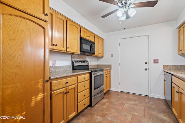 kitchen featuring appliances with stainless steel finishes, ceiling fan, and light tile patterned floors