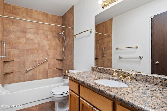 full bathroom with toilet, vanity, tile patterned flooring, and tiled shower / bath combo