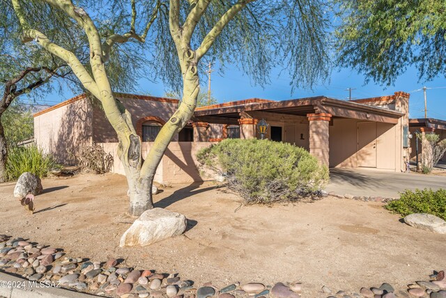 entrance to property with a patio area