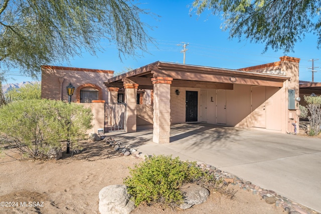 view of front of house featuring a carport