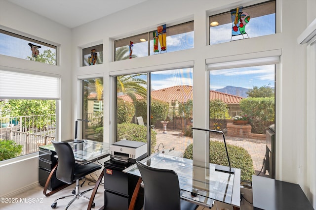 sunroom / solarium featuring plenty of natural light