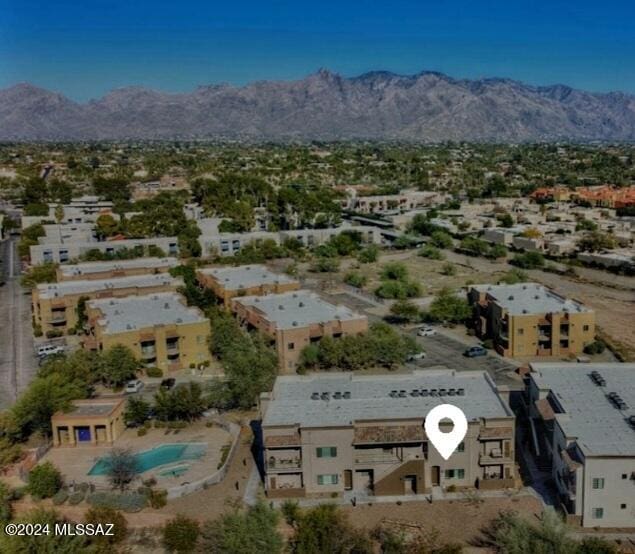 drone / aerial view featuring a mountain view