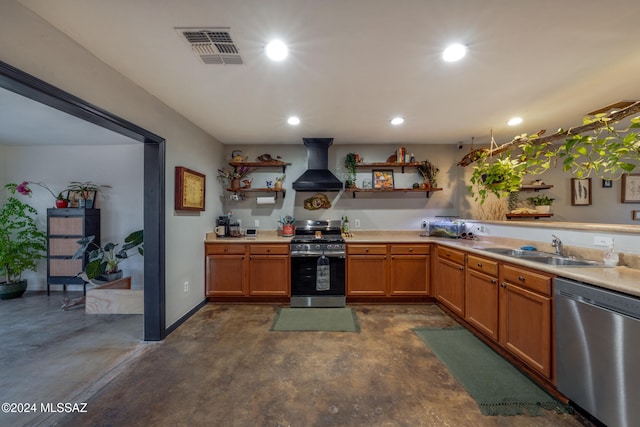 kitchen with wall chimney range hood, sink, and appliances with stainless steel finishes