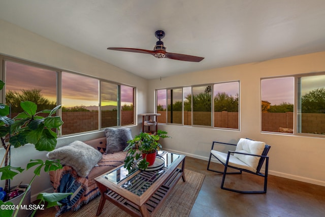 sunroom / solarium featuring ceiling fan