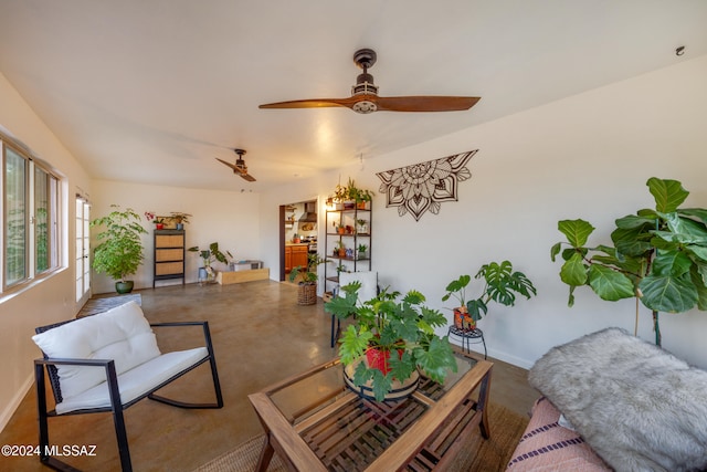 living room with ceiling fan