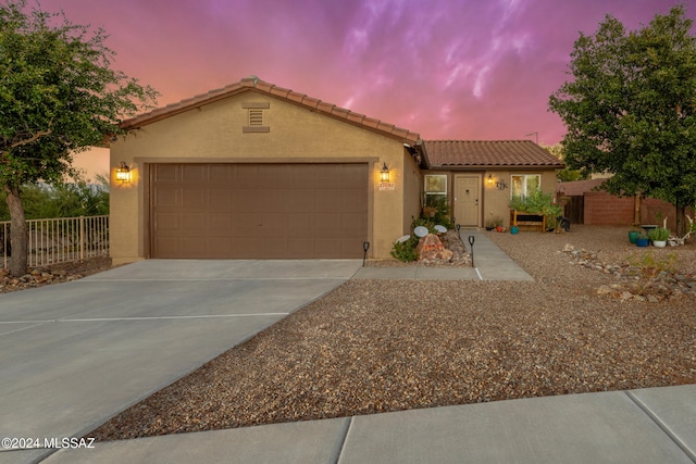 view of front of house with a garage