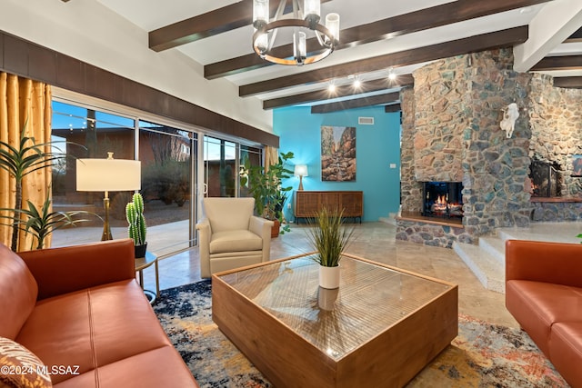 4750 N Calle Desecada, Tucson, AZ 85718 - living area with beam ceiling, a fireplace, and a chandelier