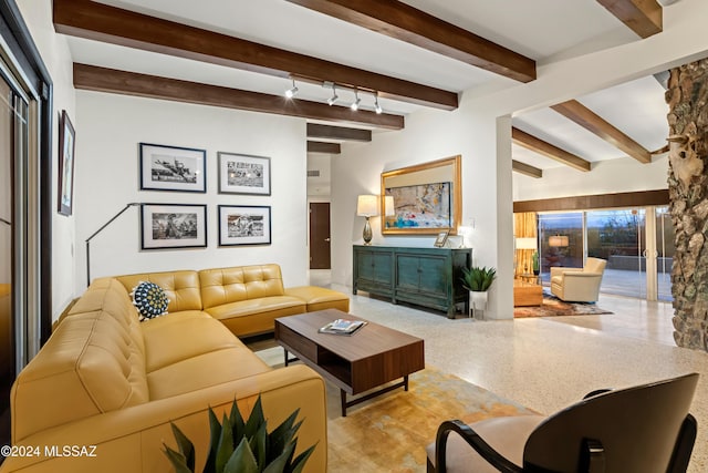 4750 N Calle Desecada, Tucson, AZ 85718 - living area featuring beam ceiling and speckle patterned floor