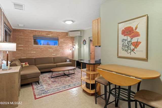 tiled living room featuring a wall mounted air conditioner and brick wall