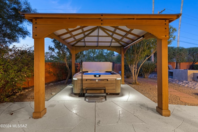 4750 N Calle Desecada, Tucson, AZ 85718 - view of patio / terrace with a gazebo and a hot tub
