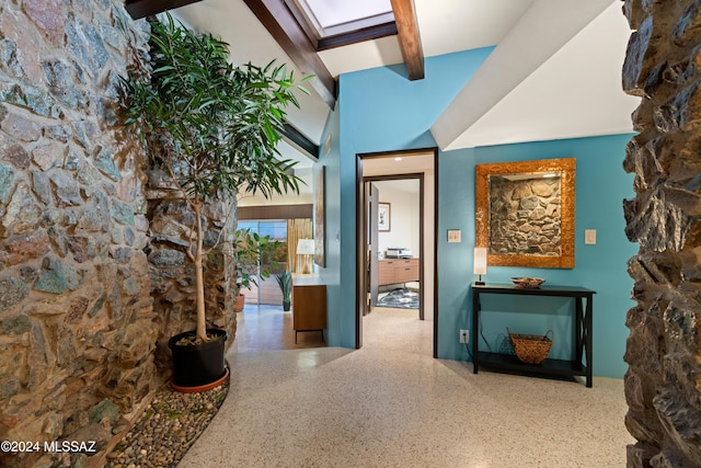 4750 N Calle Desecada, Tucson, AZ 85718 - hallway featuring beamed ceiling, speckle patterned floor, and a skylight