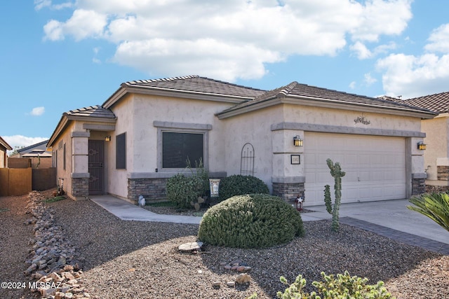 view of front of property with a garage