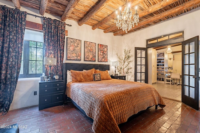 bedroom featuring wood ceiling, brick floor, beam ceiling, and a notable chandelier