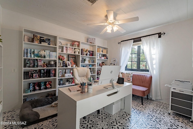 office space with a ceiling fan