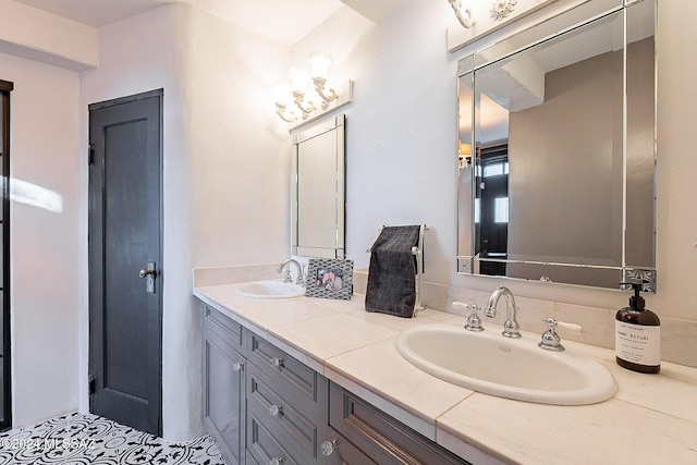 bathroom with double vanity and a sink
