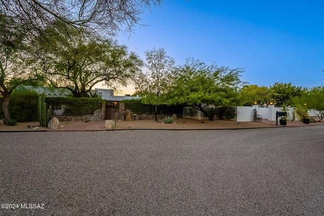 view of front of property featuring fence