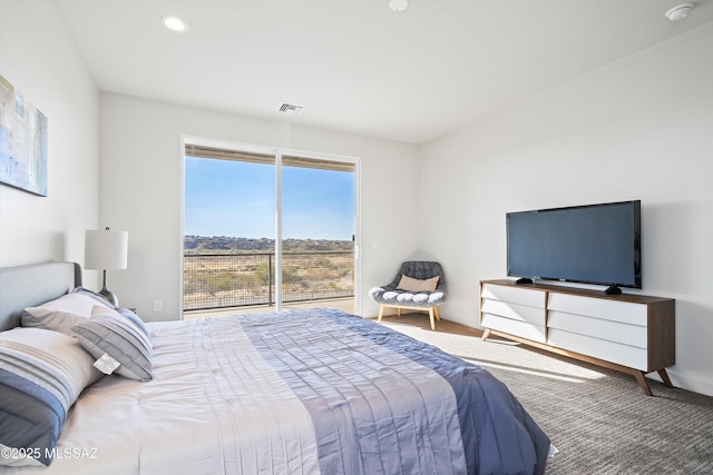 carpeted bedroom featuring access to exterior, baseboards, visible vents, and recessed lighting