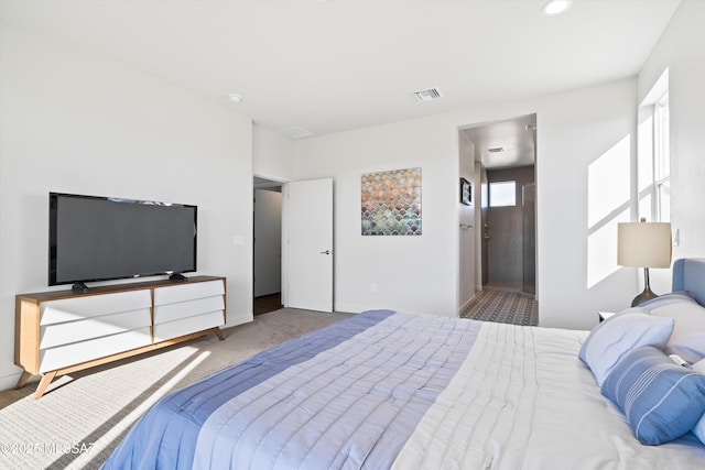 bedroom featuring carpet flooring and visible vents