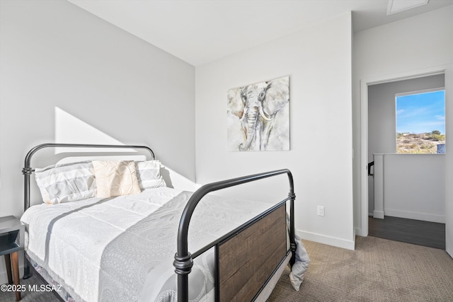 bedroom featuring carpet, visible vents, and baseboards