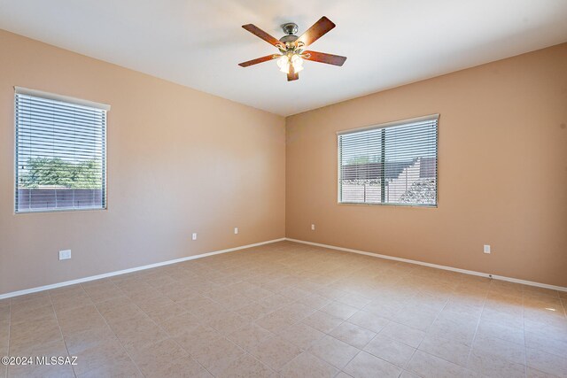 empty room with ceiling fan