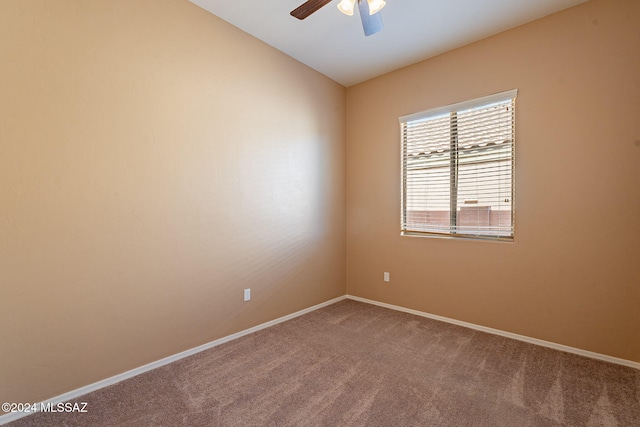 unfurnished room with lofted ceiling, carpet floors, and ceiling fan