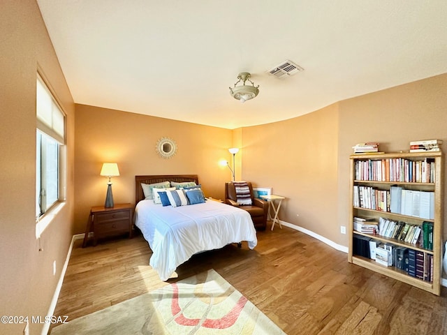 bedroom featuring light hardwood / wood-style floors