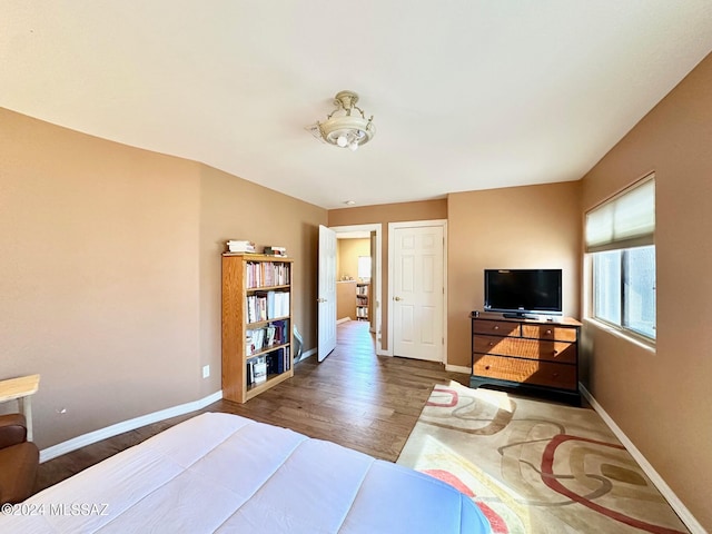 bedroom featuring hardwood / wood-style floors