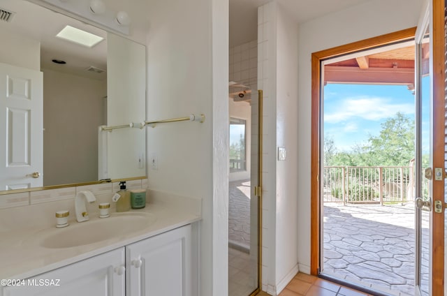 bathroom featuring vanity and tile patterned flooring