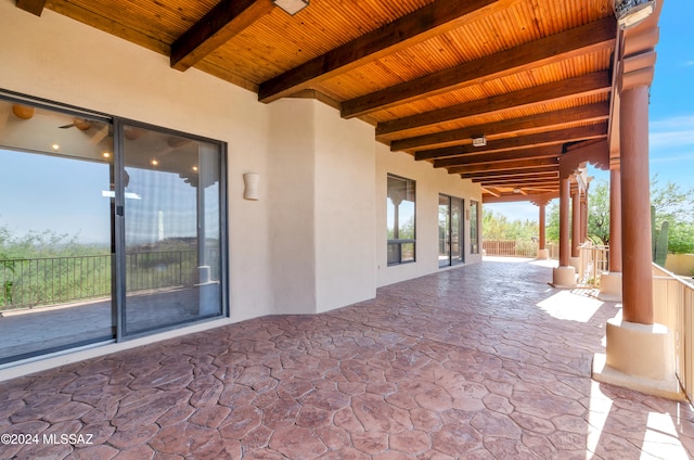 view of patio / terrace featuring ceiling fan