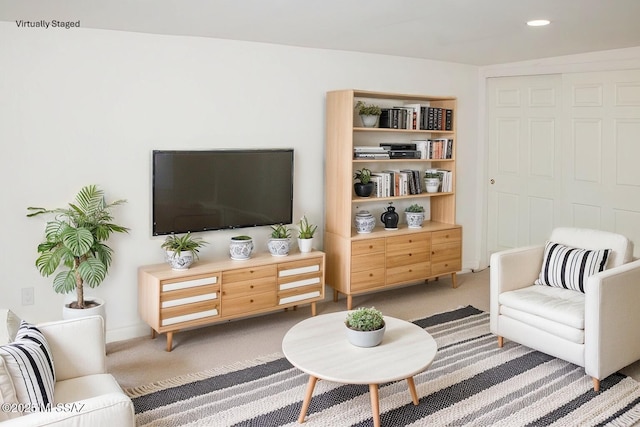 interior space featuring carpet floors and recessed lighting